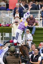 YORK, ENGLAND - AUGUST 20: Frankie Dettori leaps from his mount after riding Kinross to win The Sky Bet City Of York Stakes at York Racecourse on August 20, 2022 in York, England. (Photo by Alan Crowhurst/Getty Images)
