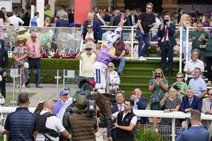 YORK, ENGLAND - AUGUST 20: Frankie Dettori leaps from his mount after riding Kinross to win The Sky Bet City Of York Stakes at York Racecourse on August 20, 2022 in York, England. (Photo by Alan Crowhurst/Getty Images)