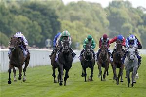 YORK, ENGLAND - AUGUST 20: Frankie Dettori riding Kinross (L) win The Sky Bet City Of York Stakes at York Racecourse on August 20, 2022 in York, England. (Photo by Alan Crowhurst/Getty Images)