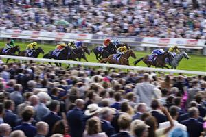 YORK, ENGLAND - AUGUST 20: Frankie Dettori riding Trawlerman (blue) win The Sky Bet Ebor Handicap from PJ McDonald riding Alfred Boucher (yellow/black) at York Racecourse on August 20, 2022 in York, England. (Photo by Alan Crowhurst/Getty Images)