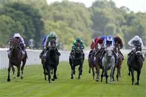 YORK, ENGLAND - AUGUST 20: Frankie Dettori riding Kinross (L) win The Sky Bet City Of York Stakes at York Racecourse on August 20, 2022 in York, England. (Photo by Alan Crowhurst/Getty Images)