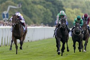 YORK, ENGLAND - AUGUST 20: Frankie Dettori riding Kinross (L) win The Sky Bet City Of York Stakes at York Racecourse on August 20, 2022 in York, England. (Photo by Alan Crowhurst/Getty Images)