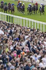 YORK, ENGLAND - AUGUST 20: Hollie Doyle riding Soulcombe (R, yellow/blue cap) win The Sky Bet Melrose Handicap at York Racecourse on August 20, 2022 in York, England. (Photo by Alan Crowhurst/Getty Images)