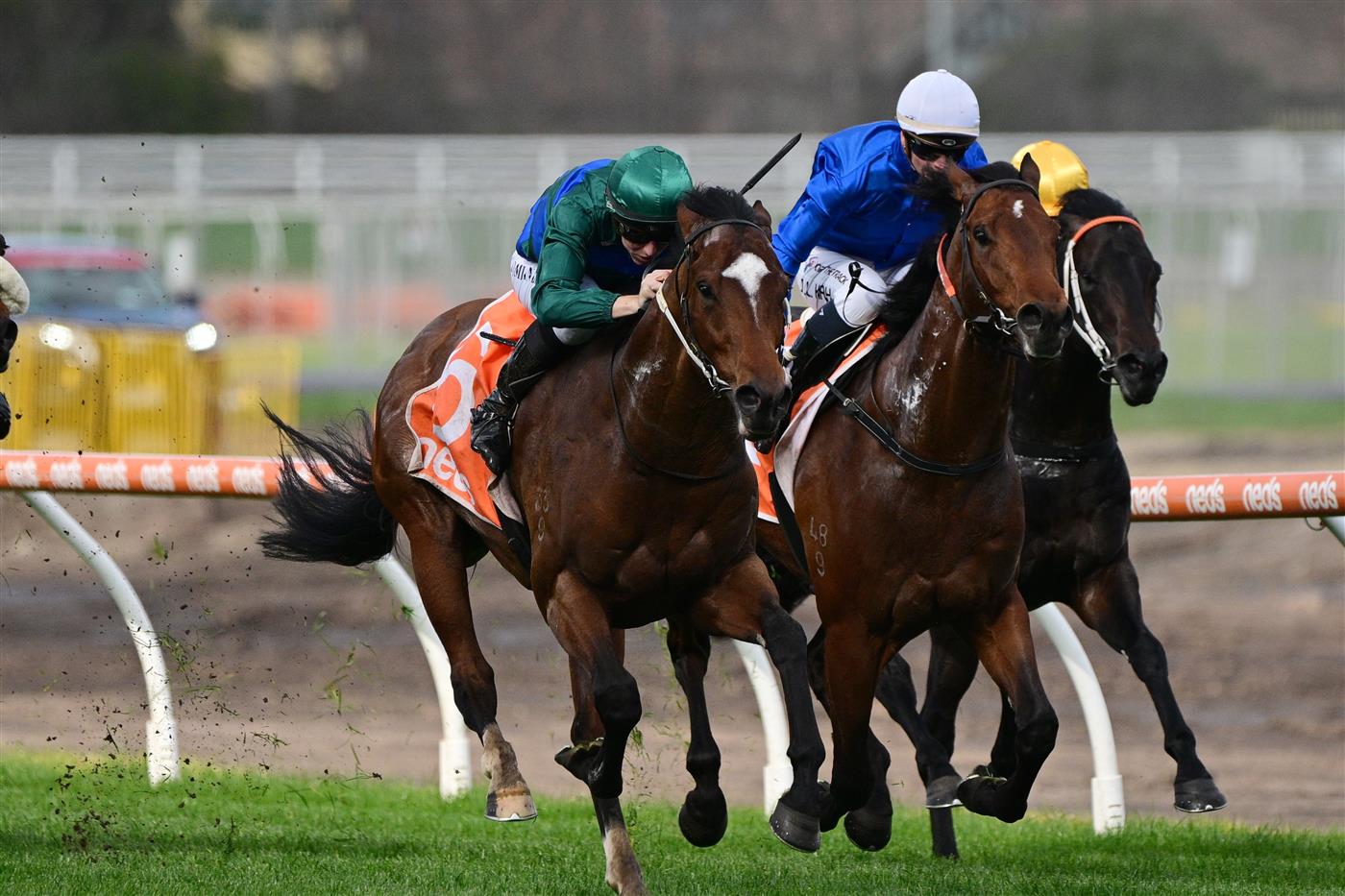 MELBOURNE, AUSTRALIA - AUGUST 27: Damian Lane riding Jacquinot (L) defeating Jamie Kah riding Aft Cabin in Race 5, the H.d.f. Mcneil Stakes, during Melbourne Racing at Caulfield Racecourse on August 27, 2022 in Melbourne, Australia. (Photo by Vince Caligiuri/Getty Images)