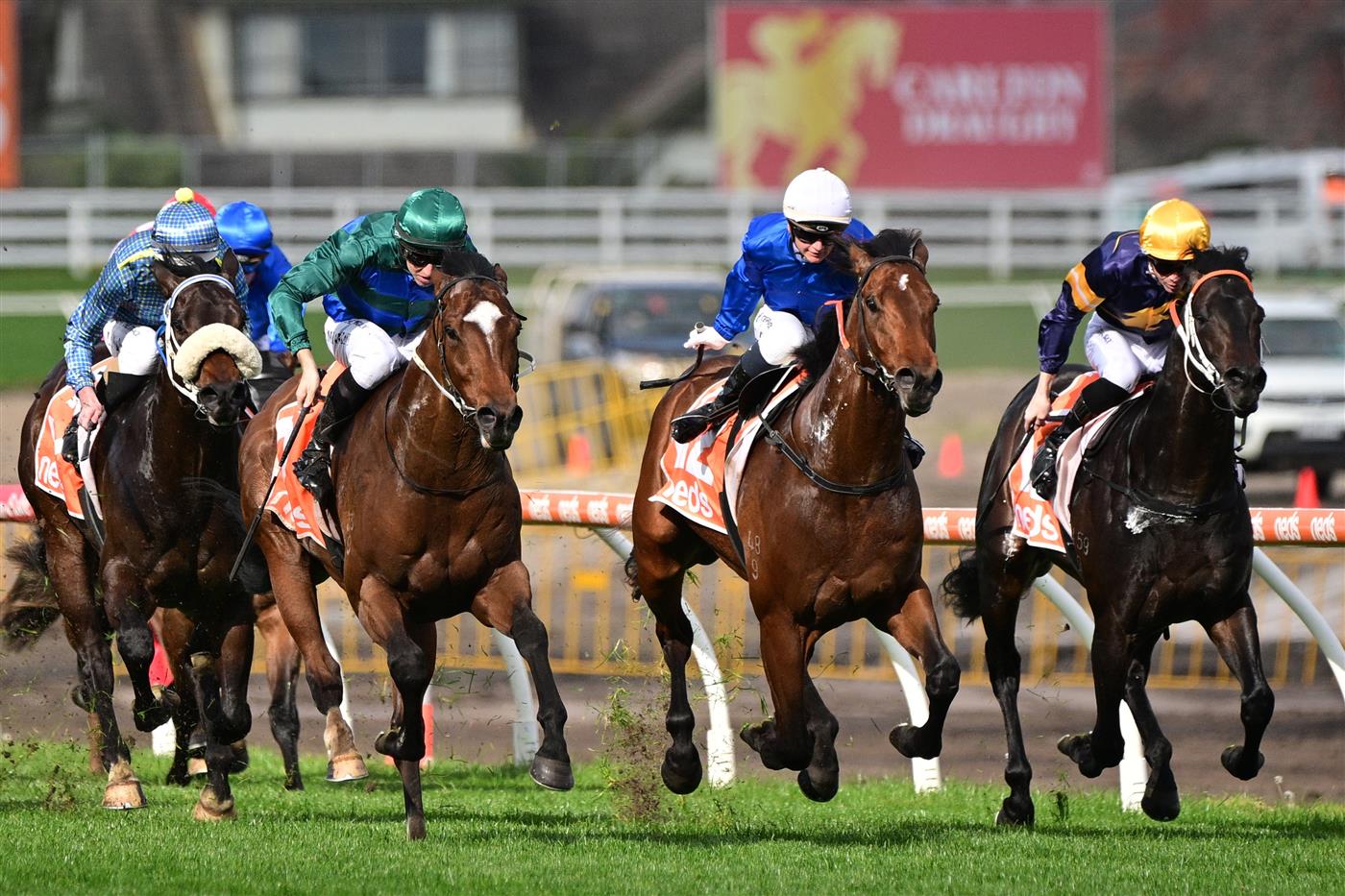 MELBOURNE, AUSTRALIA - AUGUST 27: Damian Lane riding Jacquinot (L) defeating Jamie Kah riding Aft Cabin in Race 5, the H.d.f. Mcneil Stakes, during Melbourne Racing at Caulfield Racecourse on August 27, 2022 in Melbourne, Australia. (Photo by Vince Caligiuri/Getty Images)