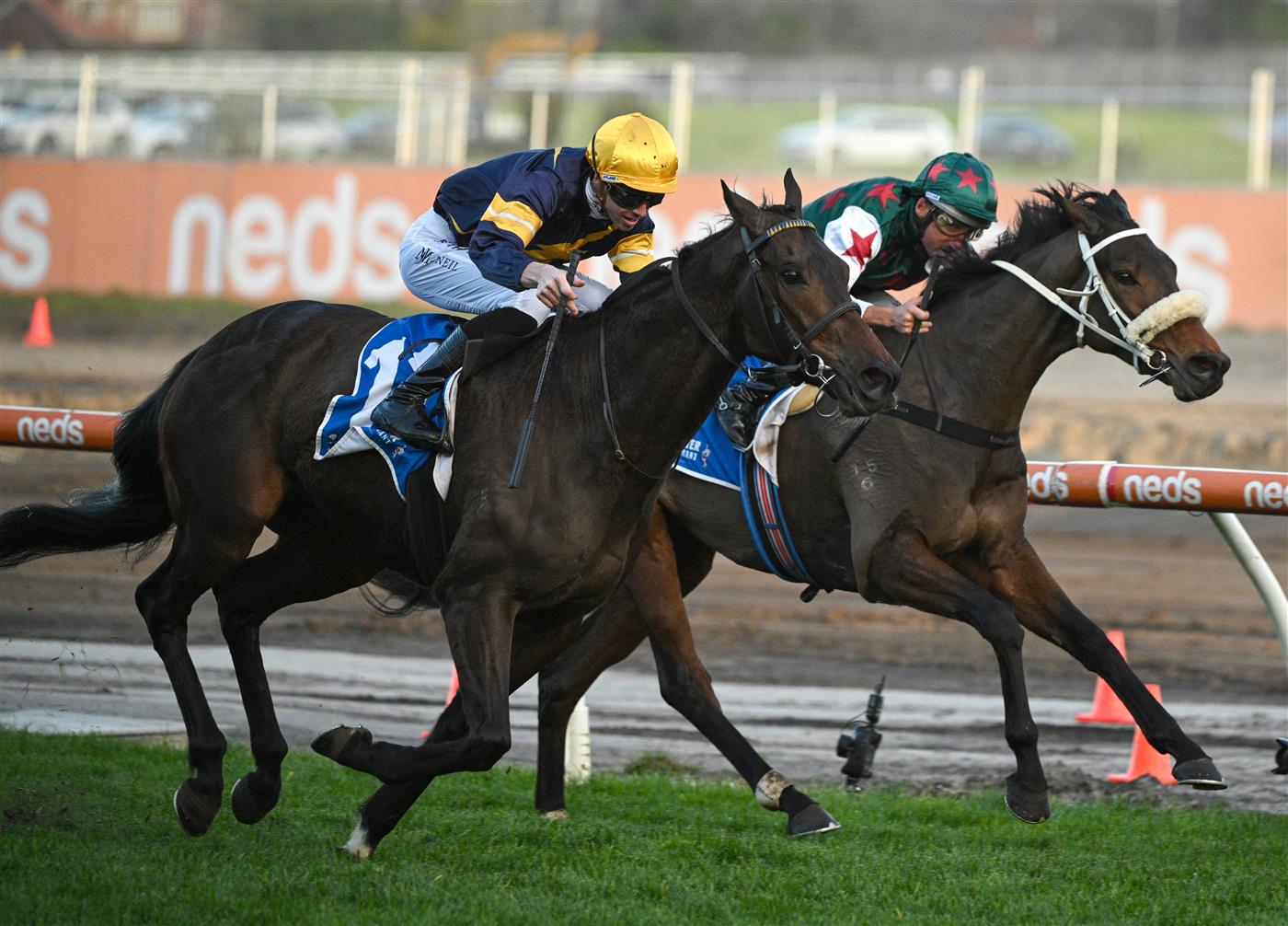 MELBOURNE, AUSTRALIA - AUGUST 27: Jye McNeil riding Emissary winning Race 9, the Tile Importer Heatherlie Stakes, during Melbourne Racing at Caulfield Racecourse on August 27, 2022 in Melbourne, Australia. (Photo by Vince Caligiuri/Getty Images)
