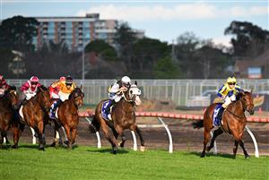 MELBOURNE, AUSTRALIA - AUGUST 27: Ethan Brown riding Snapdancer defeats Mark Zahra riding I'm Thunderstruck in Race 8, the Magic Millions Memsie Stakes, during Melbourne Racing at Caulfield Racecourse on August 27, 2022 in Melbourne, Australia. (Photo by Vince Caligiuri/Getty Images)