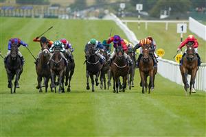 KILDARE, IRELAND - SEPTEMBER 11: Jason Hart riding Highfield Princess (R, red) win The Al Basti Equiworld, Dubai Flying Five Stakes at Curragh Racecourse on September 11, 2022 in Kildare, Ireland. (Photo by Alan Crowhurst/Getty Images)