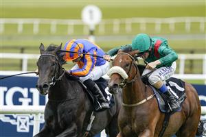 KILDARE, IRELAND - SEPTEMBER 11: Chris Hayes riding Tahiyra (green) win The Moyglare Stud Stakes at Curragh Racecourse on September 11, 2022 in Kildare, Ireland. (Photo by Alan Crowhurst/Getty Images)