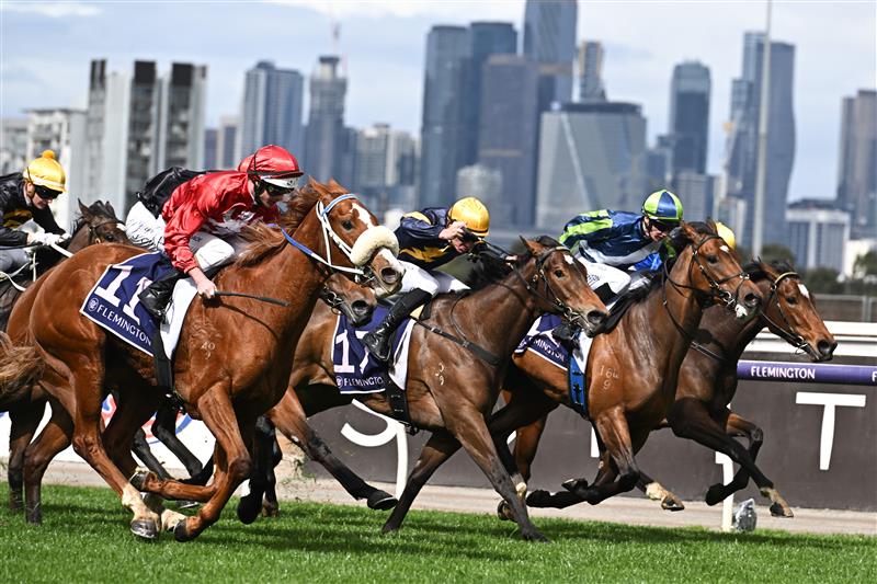 MELBOURNE, AUSTRALIA - SEPTEMBER 10: Luke Nolen riding Nanagui winning Race 3, the Cap D
