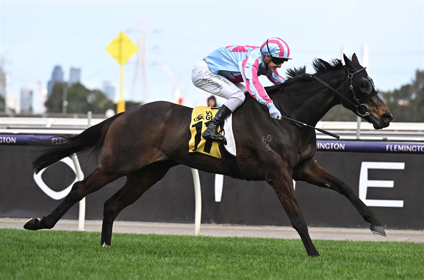 MELBOURNE, AUSTRALIA - SEPTEMBER 10: Harry Coffey riding High Emocean winning Race 6, the The Sally Chirnside,  during Melbourne Racing at Flemington Racecourse on September 10, 2022 in Melbourne, Australia. (Photo by Vince Caligiuri/Getty Images)
