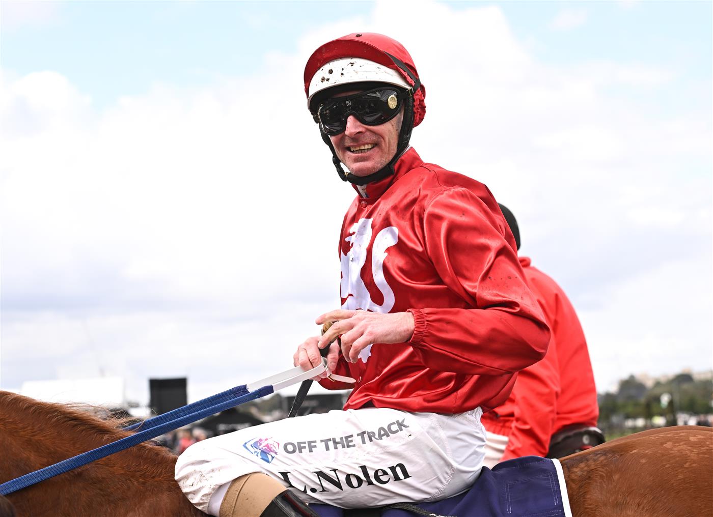 MELBOURNE, AUSTRALIA - SEPTEMBER 10: Luke Nolen riding Nanagui after winning Race 3, the Cap D