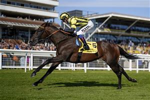 NEWBURY, ENGLAND - SEPTEMBER 17: David Egan riding Sakheer win The Dubai Duty Free Mill Reef Stakes at Newbury Racecourse on September 17, 2022 in Newbury, England. (Photo by Alan Crowhurst/Getty Images)