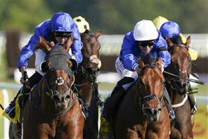 NEWBURY, ENGLAND - SEPTEMBER 17: Louis Steward riding Marching Army (all blue) win The Dubai Duty Free Handicap at Newbury Racecourse on September 17, 2022 in Newbury, England. (Photo by Alan Crowhurst/Getty Images)