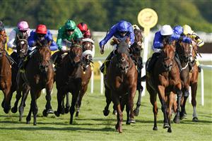 NEWBURY, ENGLAND - SEPTEMBER 17: Louis Steward riding Marching Army (all blue) win The Dubai Duty Free Handicap at Newbury Racecourse on September 17, 2022 in Newbury, England. (Photo by Alan Crowhurst/Getty Images)