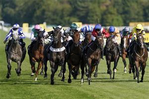 NEWBURY, ENGLAND - SEPTEMBER 17: Martin Harley riding Afterlife (red) win The RacingTV EBF Novice Stakes (GBB Race) (Div 2) at Newbury Racecourse on September 17, 2022 in Newbury, England. (Photo by Alan Crowhurst/Getty Images)