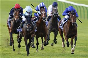 NEWMARKET, ENGLAND - SEPTEMBER 23: David Egan riding Kolsai (light blue/yellow) win The Al Basti Equiworld, Dubai British EBF 'Confined' Maiden Stakes at Newmarket Racecourse on September 23, 2022 in Newmarket, England. (Photo by Alan Crowhurst/Getty Images)