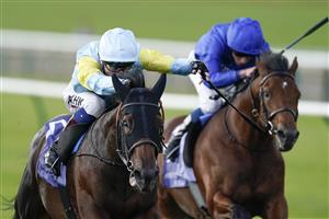 NEWMARKET, ENGLAND - SEPTEMBER 23: David Egan riding Kolsai (light blue/yellow) win The Al Basti Equiworld, Dubai British EBF 'Confined' Maiden Stakes at Newmarket Racecourse on September 23, 2022 in Newmarket, England. (Photo by Alan Crowhurst/Getty Images)