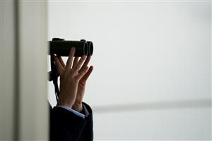 NEWMARKET, ENGLAND - SEPTEMBER 23: A racegoer watches the racing at Newmarket Racecourse on September 23, 2022 in Newmarket, England. (Photo by Alan Crowhurst/Getty Images)