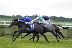 NEWMARKET, ENGLAND - SEPTEMBER 23: Jim Crowley riding Zanbaq (L) win The Al Basti Equiworld, Dubai British EBF Rosemary Stakes at Newmarket Racecourse on September 23, 2022 in Newmarket, England. (Photo by Alan Crowhurst/Getty Images)