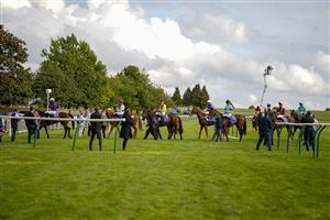 NEWMARKET, ENGLAND - SEPTEMBER 23: Runners return after finishing at Newmarket Racecourse on September 23, 2022 in Newmarket, England. (Photo by Alan Crowhurst/Getty Images)