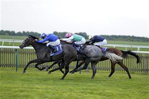 NEWMARKET, ENGLAND - SEPTEMBER 23: Jim Crowley riding Zanbaq (L) win The Al Basti Equiworld, Dubai British EBF Rosemary Stakes at Newmarket Racecourse on September 23, 2022 in Newmarket, England. (Photo by Alan Crowhurst/Getty Images)
