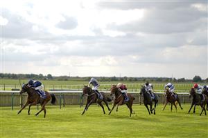 NEWMARKET, ENGLAND - SEPTEMBER 23: Robert Havlin riding Commissioning win The Al Basti Equiworld, Dubai Rockfel Stakes at Newmarket Racecourse on September 23, 2022 in Newmarket, England. (Photo by Alan Crowhurst/Getty Images)
