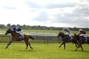 NEWMARKET, ENGLAND - SEPTEMBER 23: Robert Havlin riding Commissioning win The Al Basti Equiworld, Dubai Rockfel Stakes at Newmarket Racecourse on September 23, 2022 in Newmarket, England. (Photo by Alan Crowhurst/Getty Images)