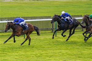 NEWMARKET, ENGLAND - SEPTEMBER 23: William Buick riding Siskany win The Al Basti Equiworld, Dubai Godolphin Stakes at Newmarket Racecourse on September 23, 2022 in Newmarket, England. (Photo by Alan Crowhurst/Getty Images)