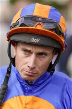 NEWMARKET, ENGLAND - SEPTEMBER 24: Ryan Moore poses at Newmarket Racecourse on September 24, 2022 in Newmarket, England. (Photo by Alan Crowhurst/Getty Images)
