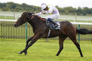NEWMARKET, ENGLAND - SEPTEMBER 24: William Buick riding Lezoo win The Juddmonte Cheveley Park Stakes at Newmarket Racecourse on September 24, 2022 in Newmarket, England. (Photo by Alan Crowhurst/Getty Images)