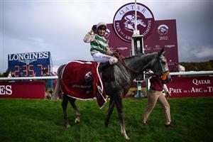 British jockey Luke Morris celebrates while riding on "Alpinista" after winning in The Prix de l