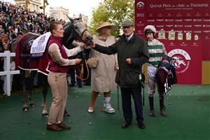 British jockey Luke Morris (R), race horse trainer Mark Prescott (2ndR) and owner Kirsten Rausing (C) celebrate winning The Prix de l