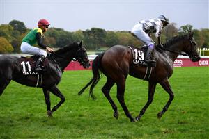 Japanese jockey Yutaka Take (R) riding on "Do Deuce" and Japanese jockey Kazuo Yokoyama riding "Titleholder" (L) are seen after competing in The Prix de l