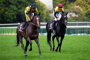 Jockey Christophe Patrice Lemaire riding on "Stay foolish" (L) and Japanese jockey Kazuo Yokoyama riding "Titleholder" are seen after The Prix de l