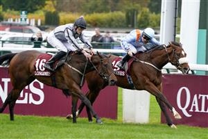 PARIS, FRANCE - OCTOBER 02: Hollie Doyle riding The Platinum Queen (R) win The Prix de l