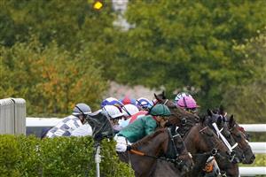 PARIS, FRANCE - OCTOBER 02: Runners leave the stalls for The Qatar Prix de l