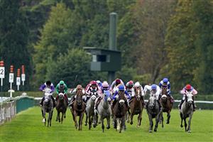 PARIS, FRANCE - OCTOBER 02: Jim Crowley riding Lady Princess (C, blue cap) win The Qatar Arabian World Cup at Hippodrome de ParisLongchamp on October 02, 2022 in Paris, France. (Photo by Alan Crowhurst/Getty Images)