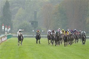PARIS, FRANCE - OCTOBER 02: Luke Morris riding Alpinista (L) win The Qatar Prix de l