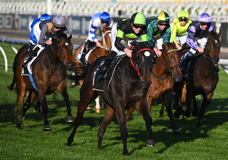 MELBOURNE, AUSTRALIA - OCTOBER 01: Joshua Parr riding Private Eye winning Race 8, the Gilgai Stakes , during Turnbull Stakes Day at Flemington Racecourse on October 01, 2022 in Melbourne, Australia. (Photo by Vince Caligiuri/Getty Images)