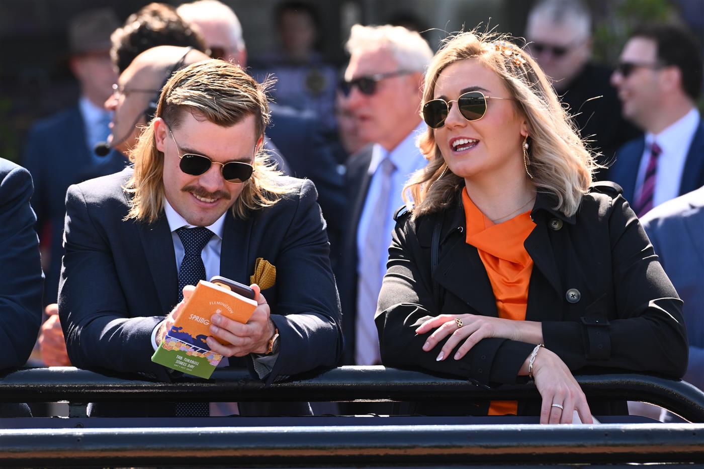 MELBOURNE, AUSTRALIA - OCTOBER 01: Australian swimmer, Ariarne Titmus and Kyle Niesler are seen during Turnbull Stakes Day at Flemington Racecourse on October 01, 2022 in Melbourne, Australia. (Photo by Vince Caligiuri/Getty Images)