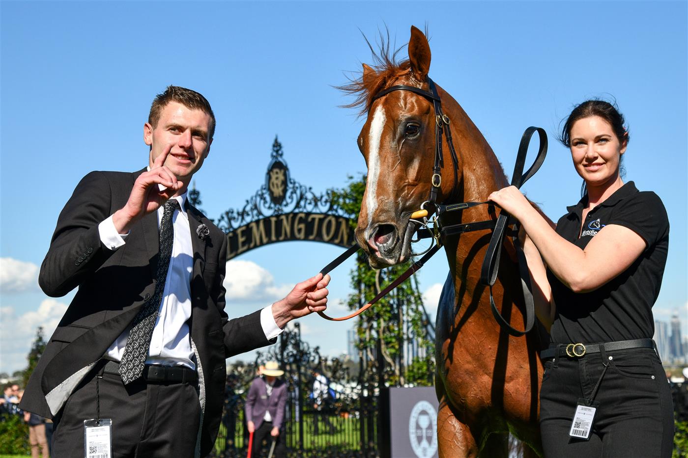 MELBOURNE, AUSTRALIA - OCTOBER 01: Trainer Clayton Douglas poses with Giga Kick after winning Race 5, the Hq Tavern Danehill Stakes, during Turnbull Stakes Day at Flemington Racecourse on October 01, 2022 in Melbourne, Australia. (Photo by Vince Caligiuri/Getty Images)