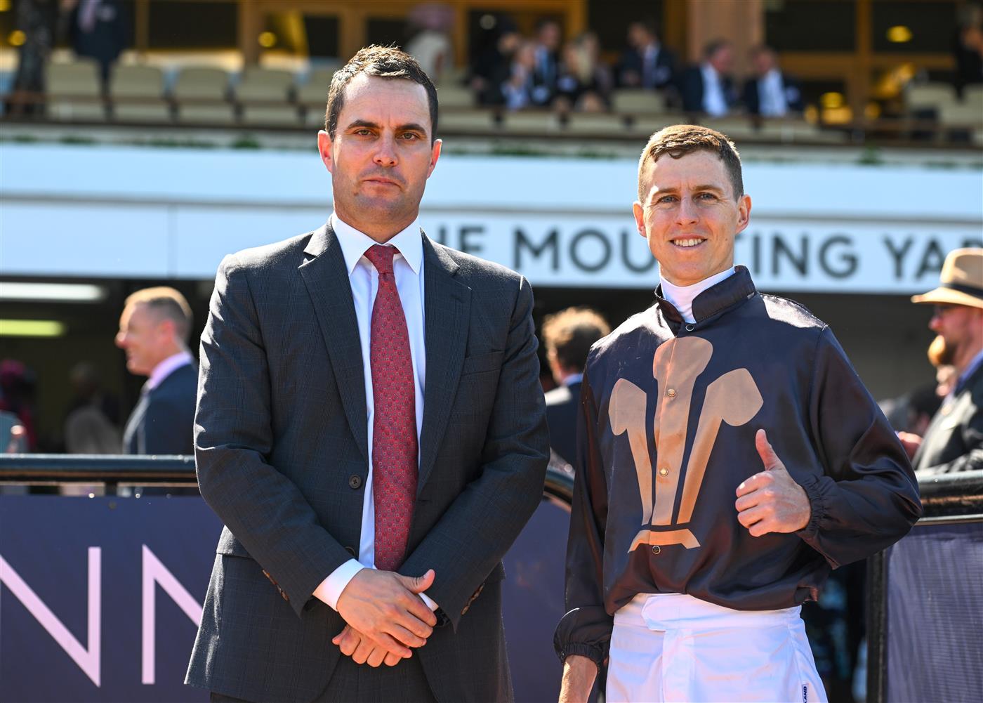 MELBOURNE, AUSTRALIA - OCTOBER 01: Damian Lane poses with trainer Andrew Forsman after riding She's Licketysplit to win race 3, the TAB Edward Manifold Stakes, during Turnbull Stakes Day at Flemington Racecourse on October 01, 2022 in Melbourne, Australia. (Getty)