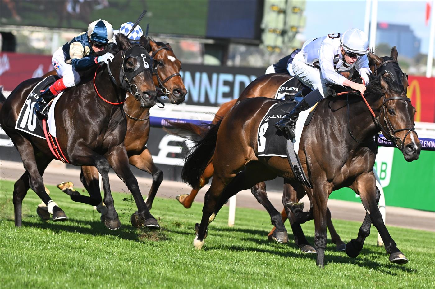 MELBOURNE, AUSTRALIA - OCTOBER 01: Michael Dee riding Lunar Flare winning Race 6, the The Lexus Bart Cummings, during Turnbull Stakes Day at Flemington Racecourse on October 01, 2022 in Melbourne, Australia. (Photo by Vince Caligiuri/Getty Images)