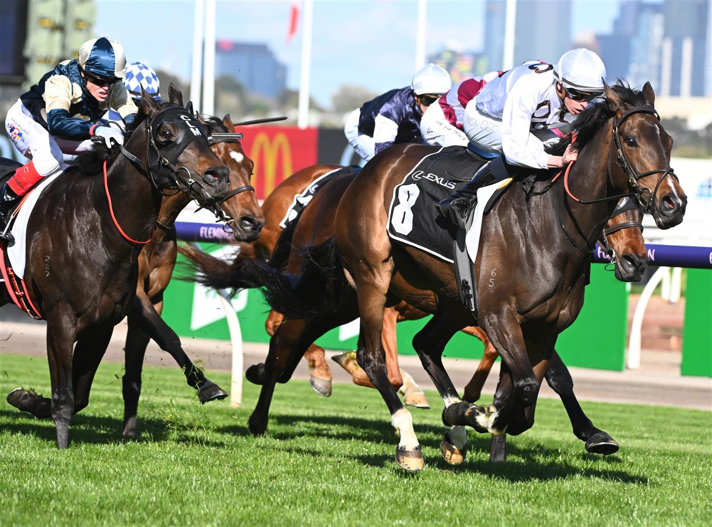 MELBOURNE, AUSTRALIA - OCTOBER 01: Michael Dee riding Lunar Flare winning Race 6, the The Lexus Bart Cummings, during Turnbull Stakes Day at Flemington Racecourse on October 01, 2022 in Melbourne, Australia. (Photo by Vince Caligiuri/Getty Images)