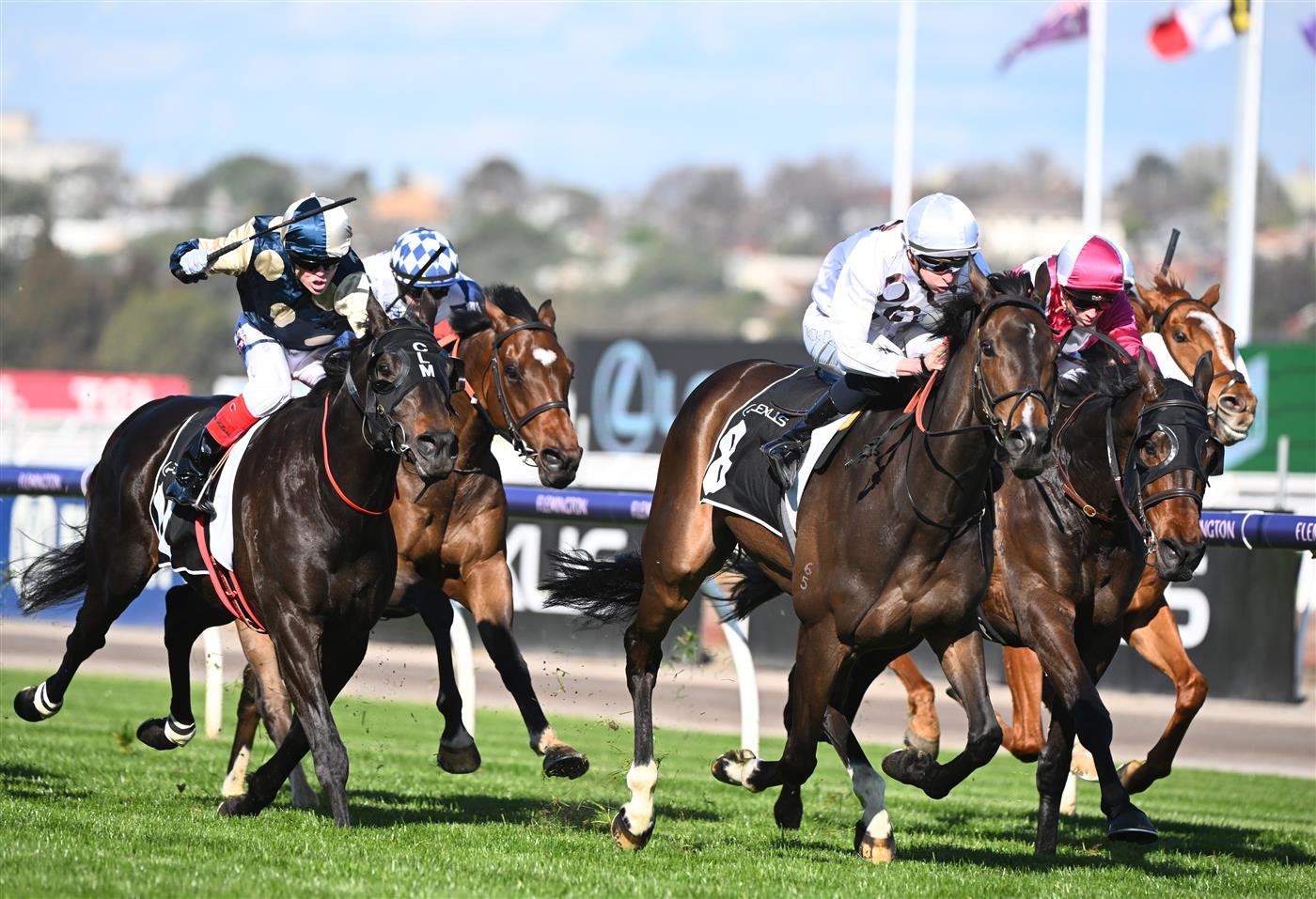 MELBOURNE, AUSTRALIA - OCTOBER 01: Michael Dee riding Lunar Flare winning Race 6, the The Lexus Bart Cummings, during Turnbull Stakes Day at Flemington Racecourse on October 01, 2022 in Melbourne, Australia. (Photo by Vince Caligiuri/Getty Images)