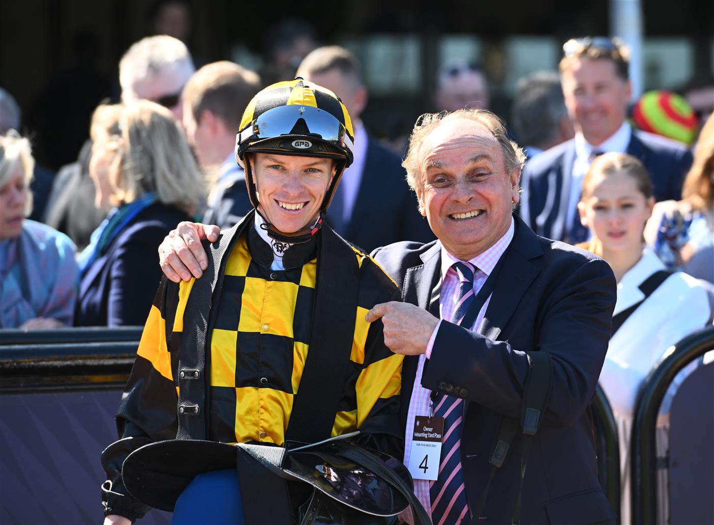 MELBOURNE, AUSTRALIA - OCTOBER 01: Michael Dee poses with Henry Plumptre after riding Excelida to win Race 4, the Furphy Rose Of Kingston Stakes, during Turnbull Stakes Day at Flemington Racecourse on October 01, 2022 in Melbourne, Australia. (Photo by Vince Caligiuri/Getty Images)