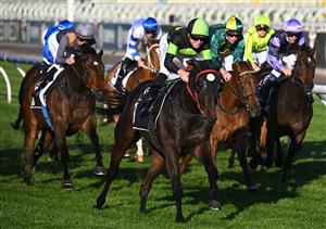 MELBOURNE, AUSTRALIA - OCTOBER 01: Joshua Parr riding Private Eye winning Race 8, the Gilgai Stakes , during Turnbull Stakes Day at Flemington Racecourse on October 01, 2022 in Melbourne, Australia. (Photo by Vince Caligiuri/Getty Images)