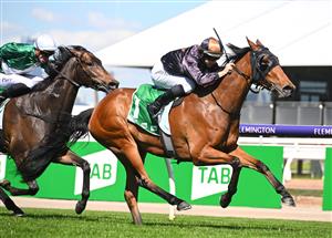 MELBOURNE, AUSTRALIA - OCTOBER 01: Damian Lane riding She's Licketysplit to win race 3, the TAB Edward Manifold Stakes, during Turnbull Stakes Day at Flemington Racecourse on October 01, 2022 in Melbourne, Australia. (Getty)