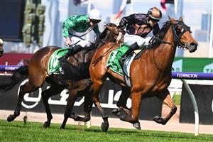 MELBOURNE, AUSTRALIA - OCTOBER 01: Damian Lane riding She's Licketysplit to win race 3, the TAB Edward Manifold Stakes, during Turnbull Stakes Day at Flemington Racecourse on October 01, 2022 in Melbourne, Australia. (Getty)